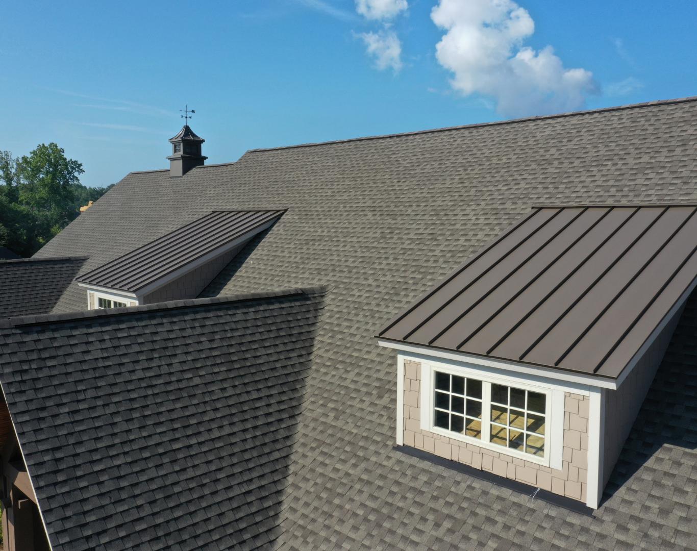 Reliable Roofing Company in Brooklyn Park, MN performing full roof replacement
