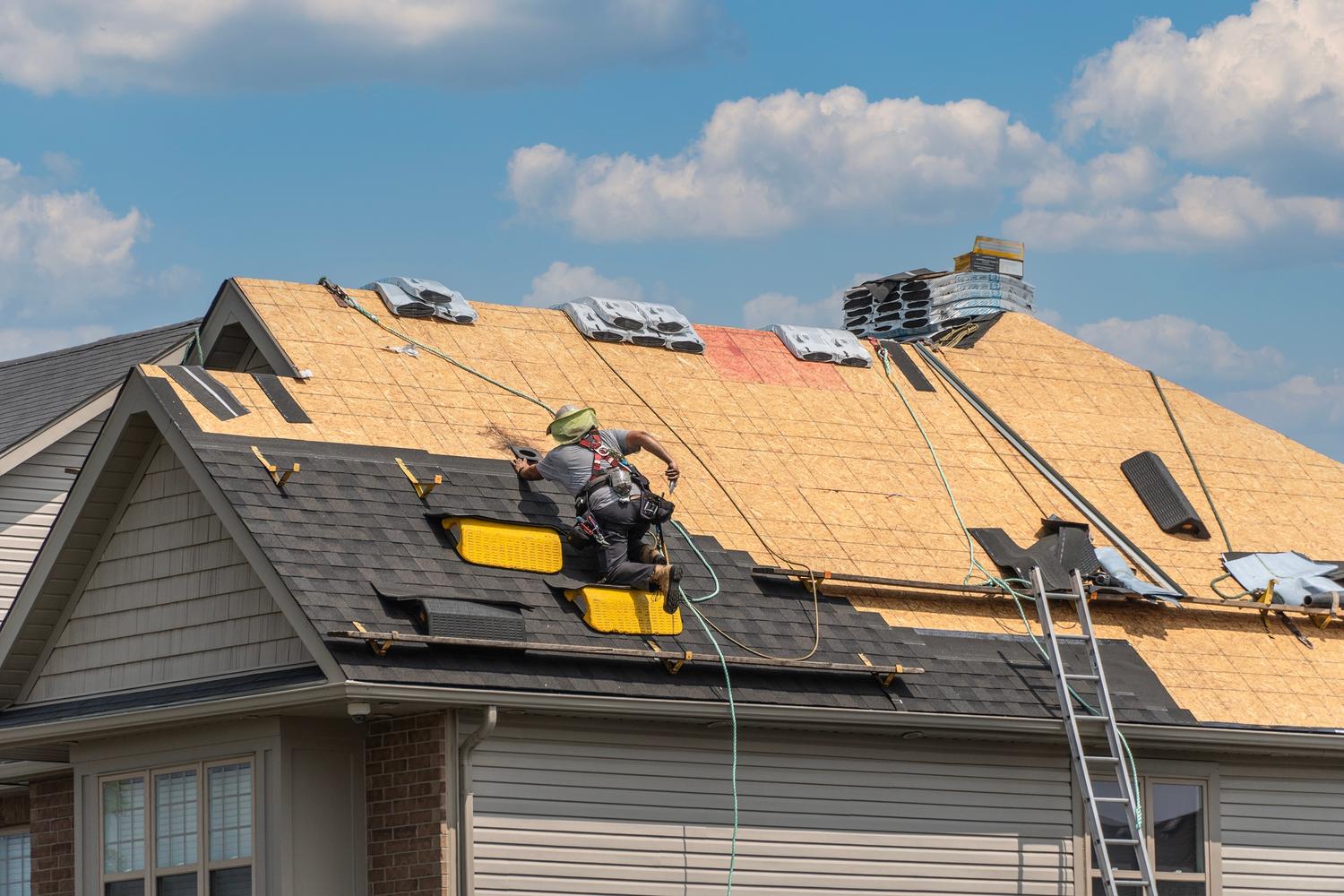 Reliable Roofing Company in Anoka County, MN completing residential roof replacement