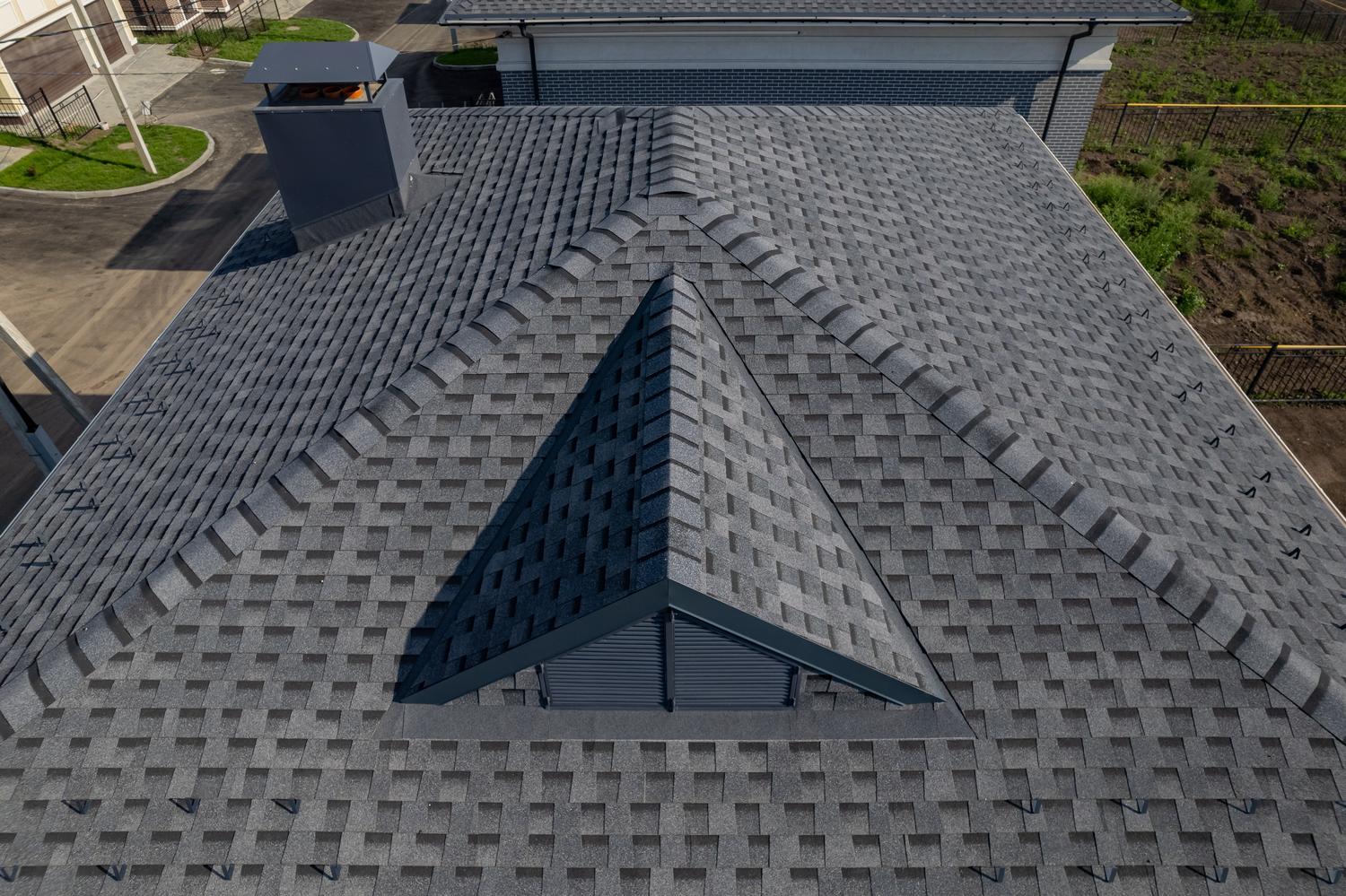 Reliable Roofing Company in Olmsted County, MN completing residential roof replacement