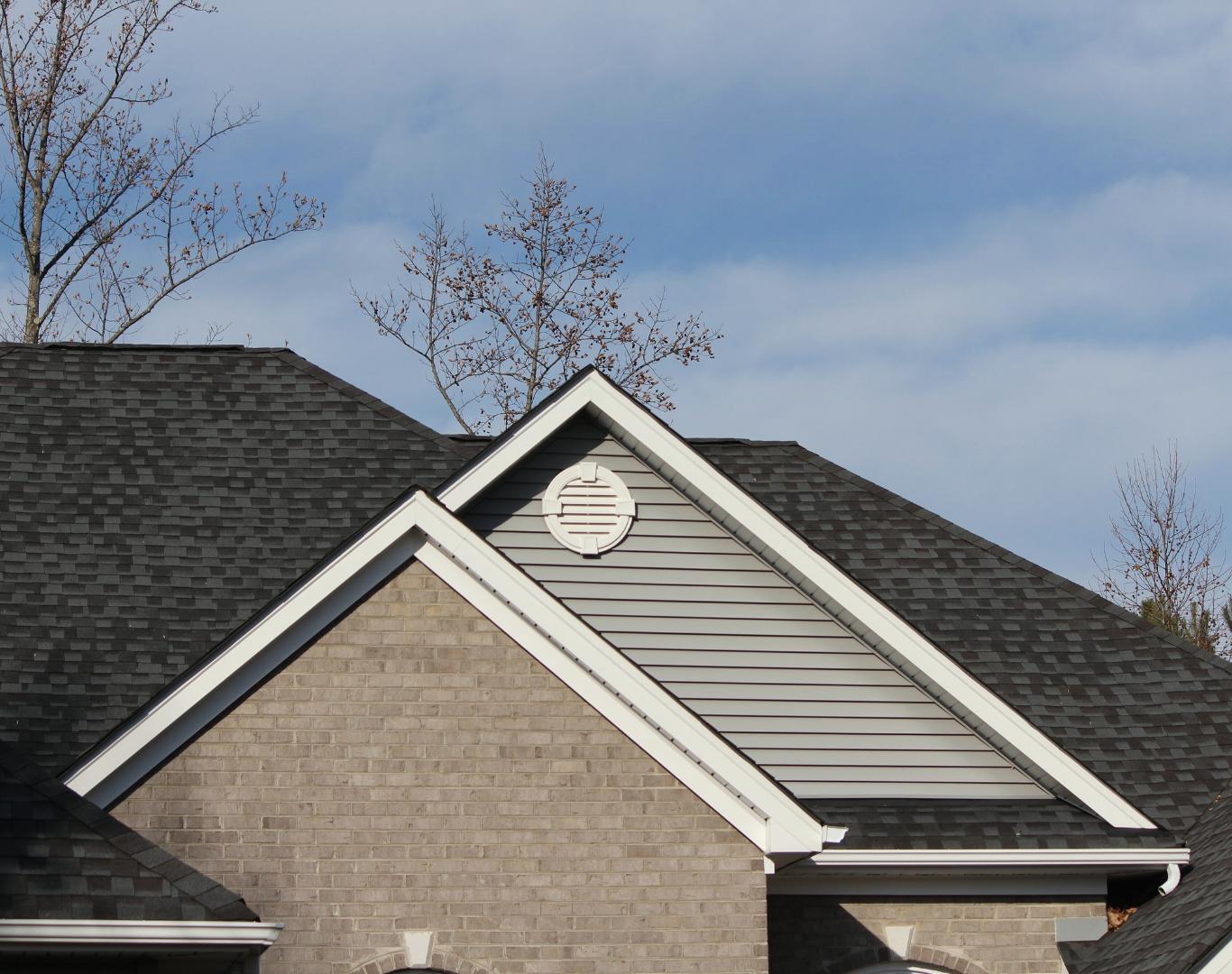 Reliable Roofing Company in Shoreview, MN completing residential roof replacement