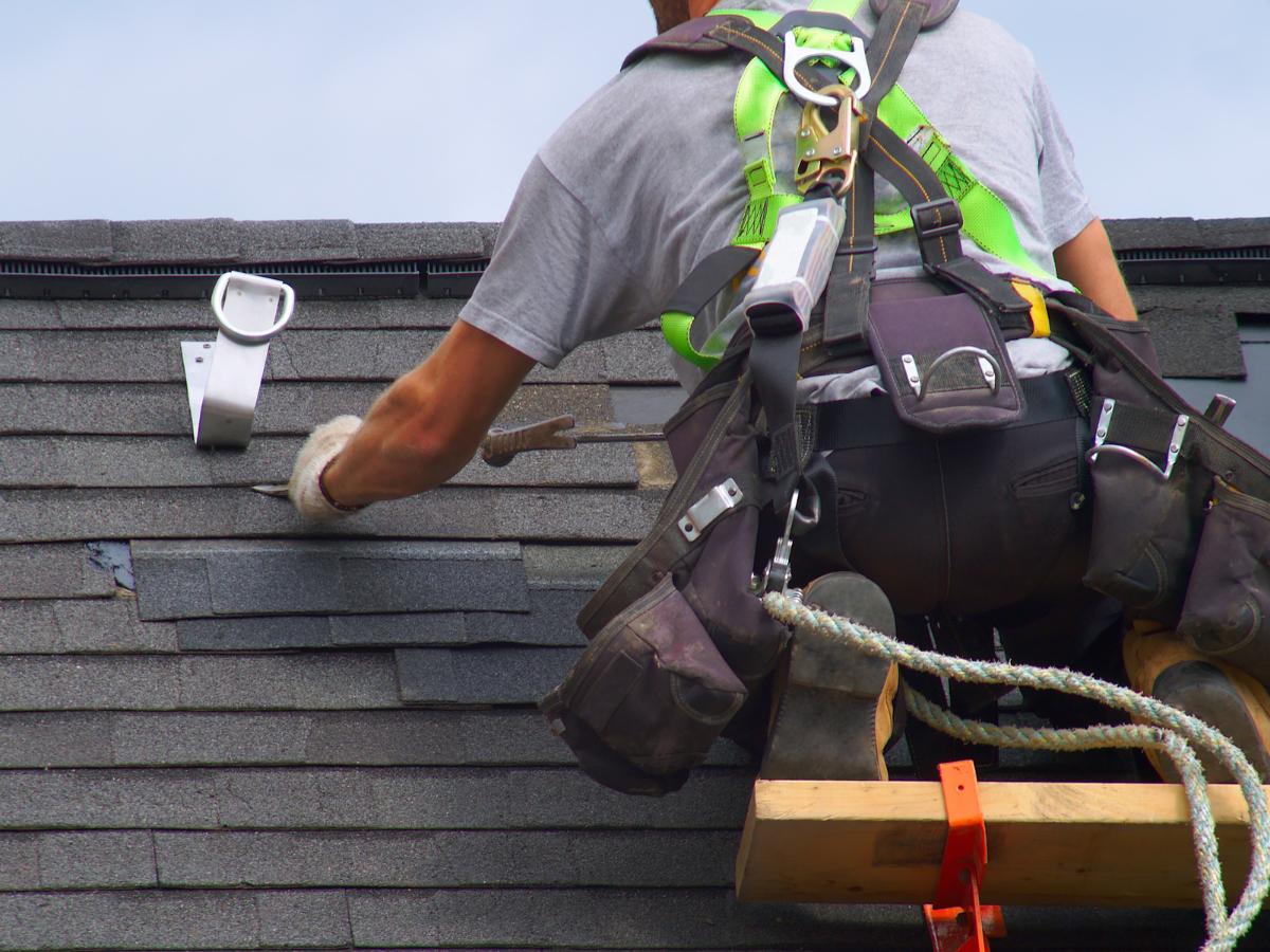 Reliable Roofing Company in Delano, MN completing residential roof replacement